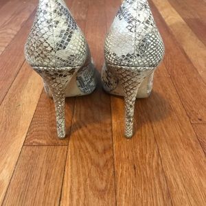 INC snake skin pumps
